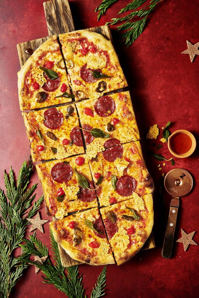 Styled food and drink photography showing pizza rustica, Italian food, photographed in a professional Sussex studio using flash lights